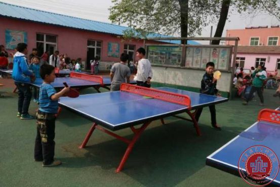 我院志愿者为新龙小学开展“红烛行动—趣味运动会”活动